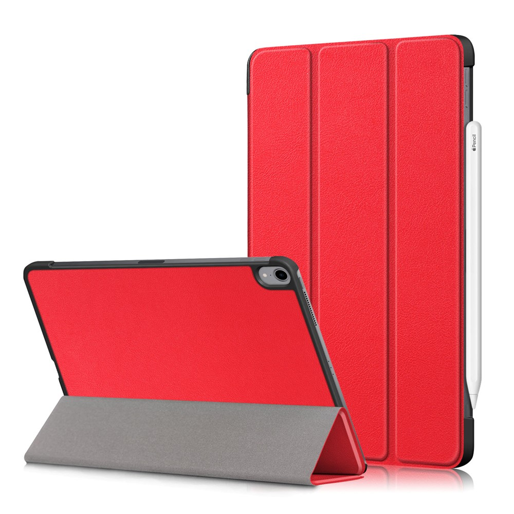 Roter Tablet-Ständer mit Stift auf weißem Hintergrund.