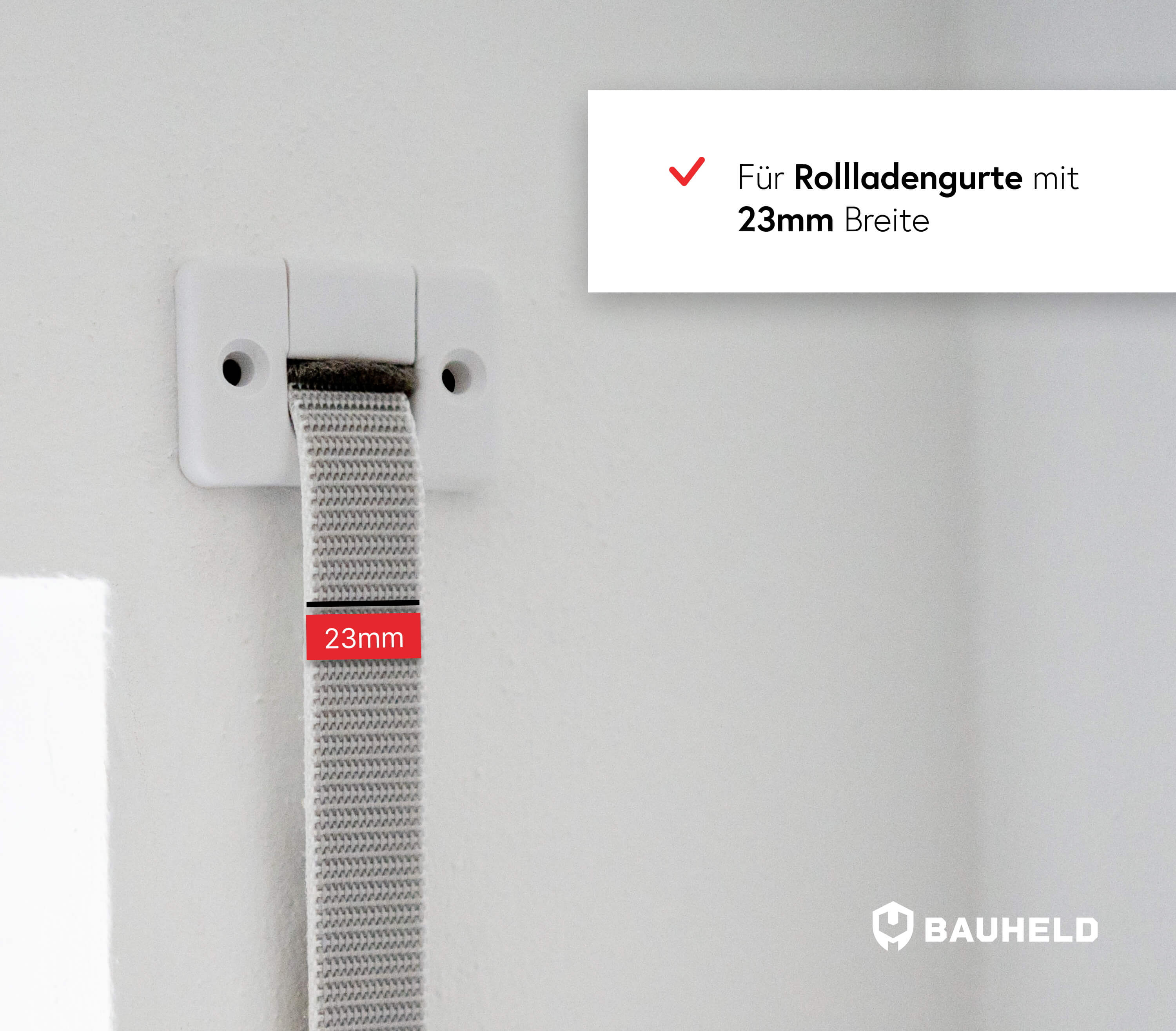 Rollladengurt 23mm breit, befestigt an weißer Wandhalterung.