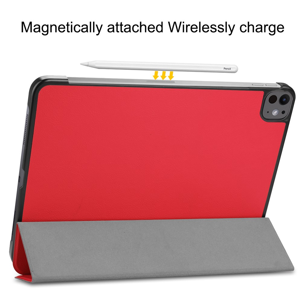 Rotes Tablet mit Stift und Ständer. Magnetische Aufladung.