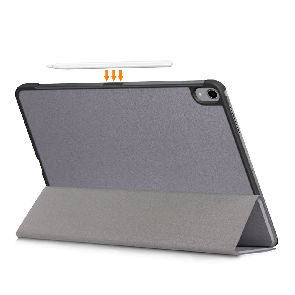 Grauer Tablet-Ständer mit Stift und Pfeilen, die auf die Rückseite zeigen.