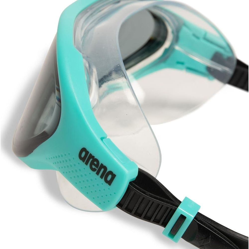 Türkisfarbene Schwimmbrille mit klarem Rahmen und schwarzem Band.