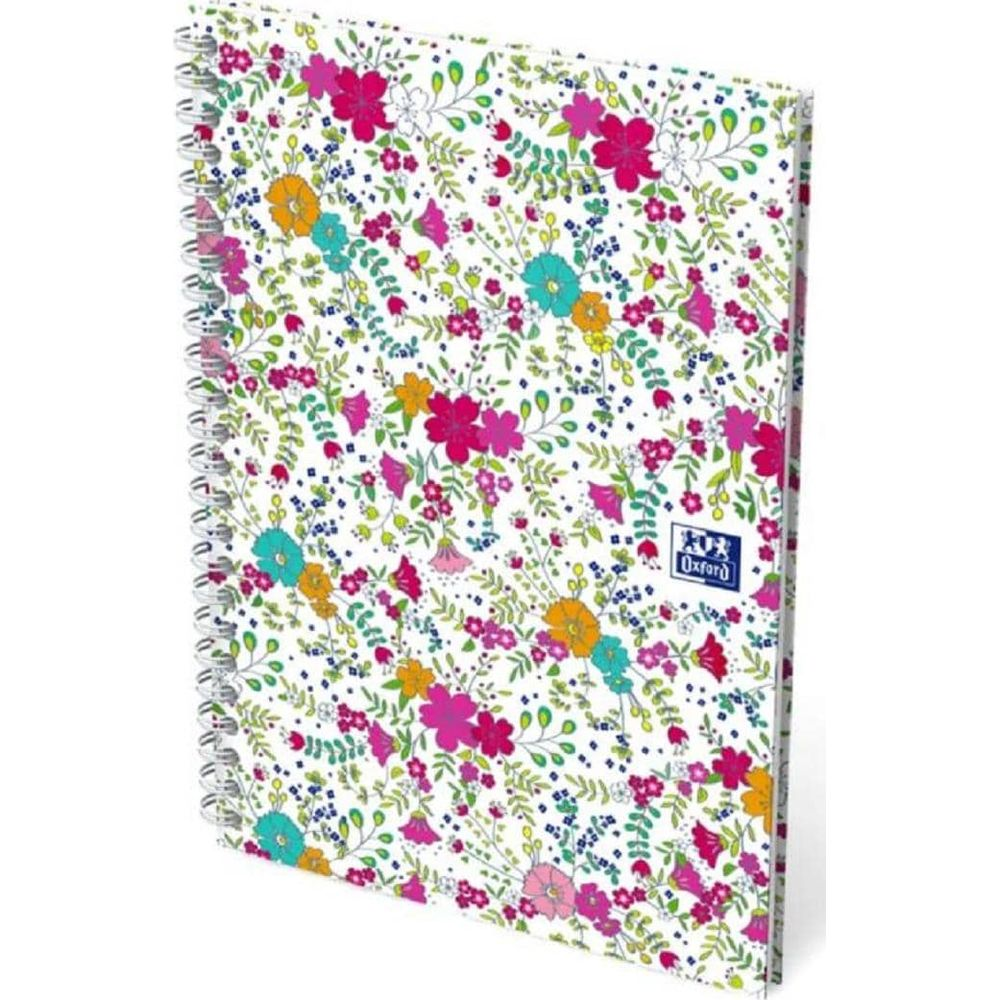 Ein Notizbuch mit Spiralbindung und einem weißen Einband mit einem bunten Blumenmuster.
