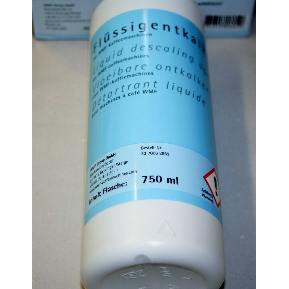 Weiße Flasche mit blauer Beschriftung für Flüssigentkalker, 750 ml.