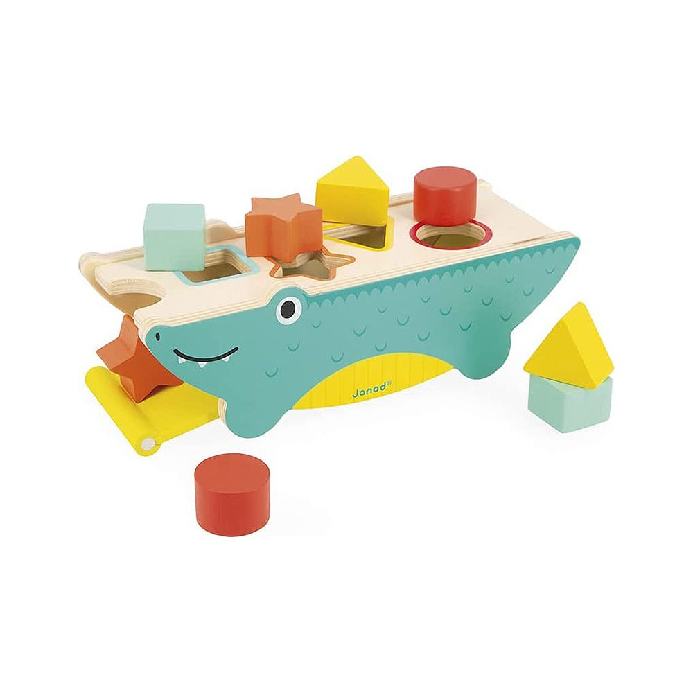 Un giocattolo a forma di coccodrillo blu con blocchi di legno colorati.