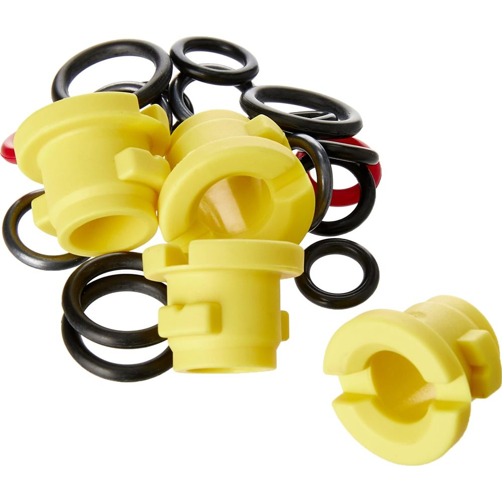 Connettori gialli e O-ring neri su sfondo bianco.