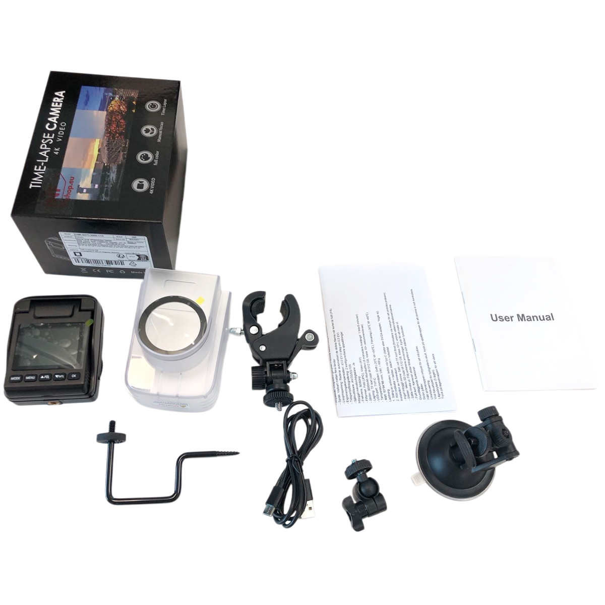 Time-lapse camera kit: camera, manual, cable, suction cup mount, accessories.
