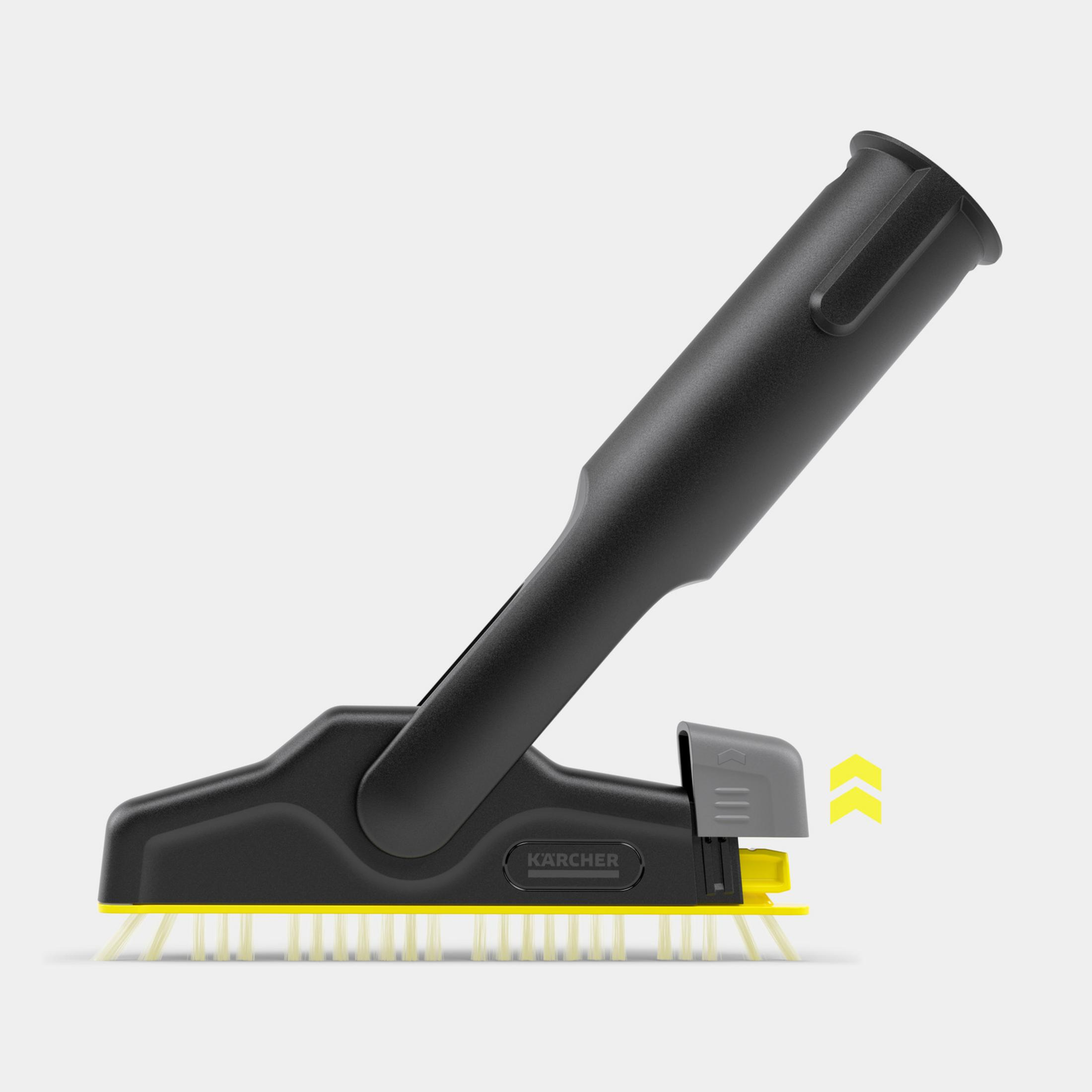 Czarna głowica szczotki z żółtym włosiem i logo Karcher.