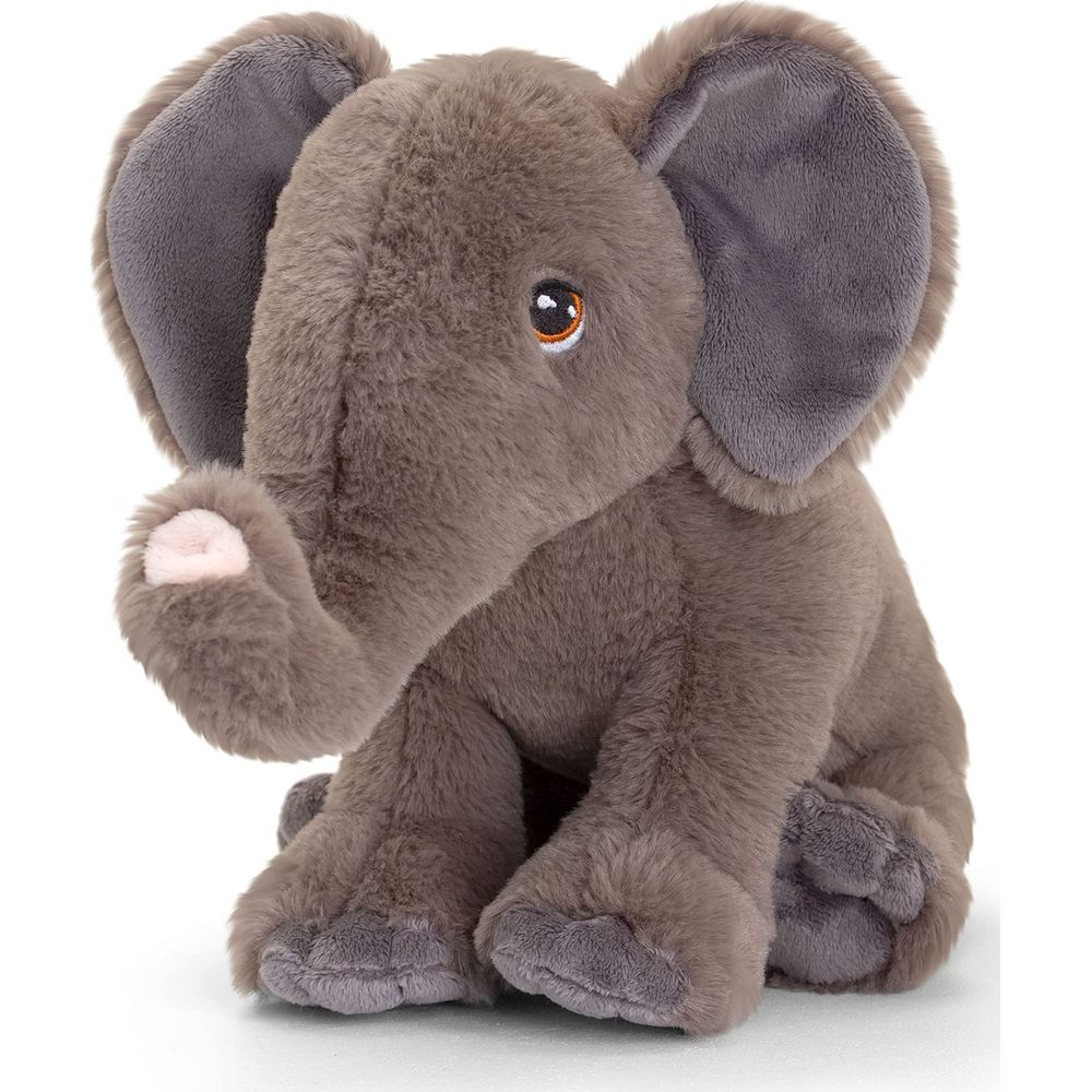 Un elefante di peluche grigio seduto su sfondo bianco, con grandi orecchie e proboscide.