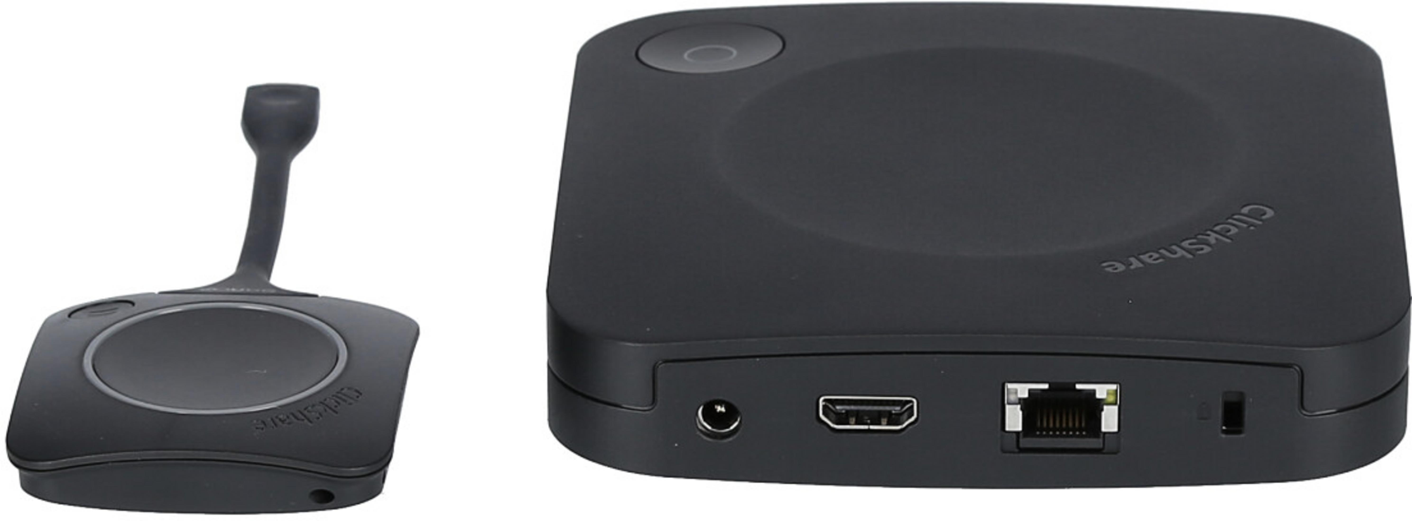 Due dispositivi ClickShare neri: un pulsante, un'unità base con porte.