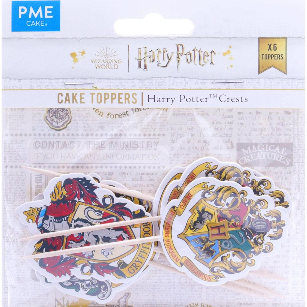Harry Potter Kuchen-Topper mit Hauswappen: Gryffindor, Slytherin, Hufflepuff, Ravenclaw.