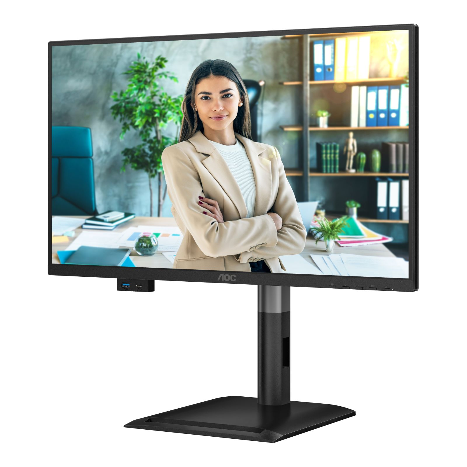 Een vrouw in een beige blazer voor een monitor met kantoordocumenten en planten.