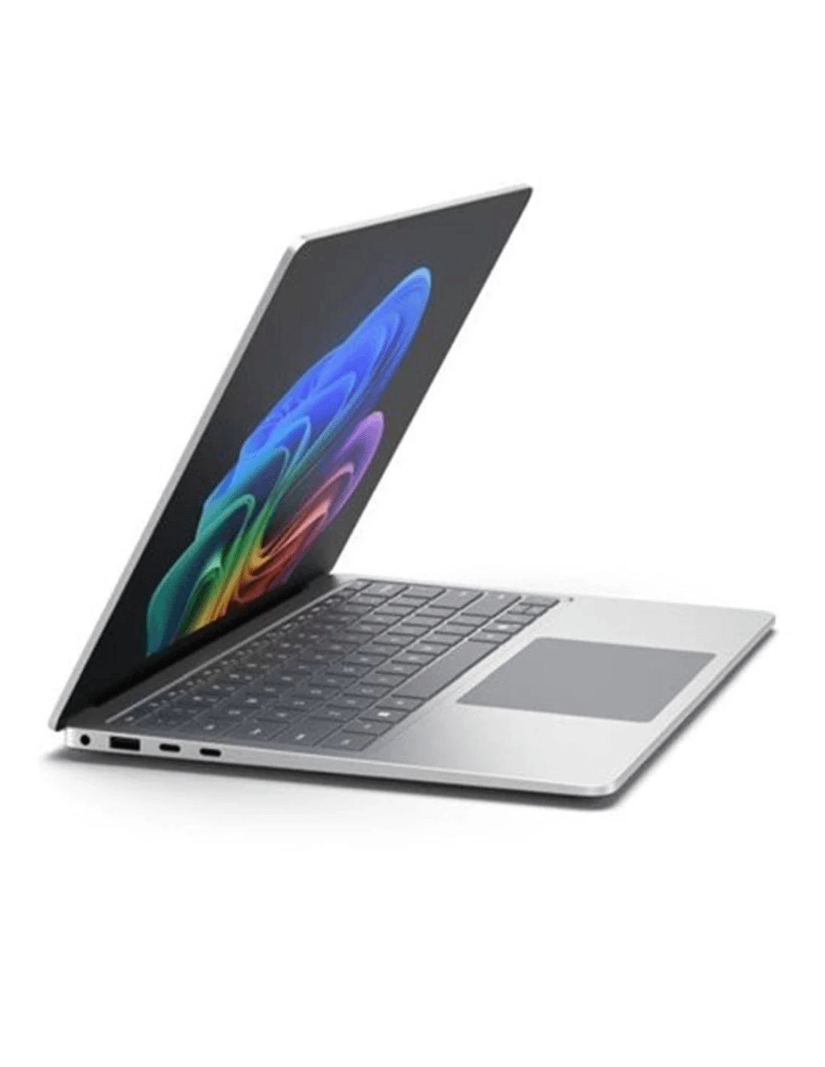 Un portátil plateado con teclado y panel táctil, abierto mostrando un fondo de pantalla colorido.