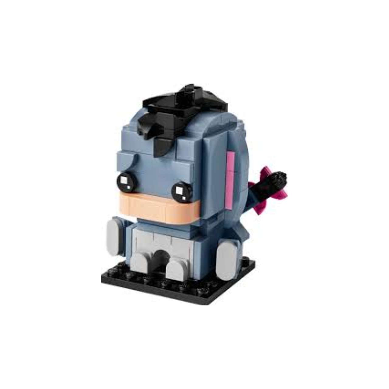 Siyah ve pembe vurgulu gri Lego eşek siyah bir taban üzerinde duruyor.