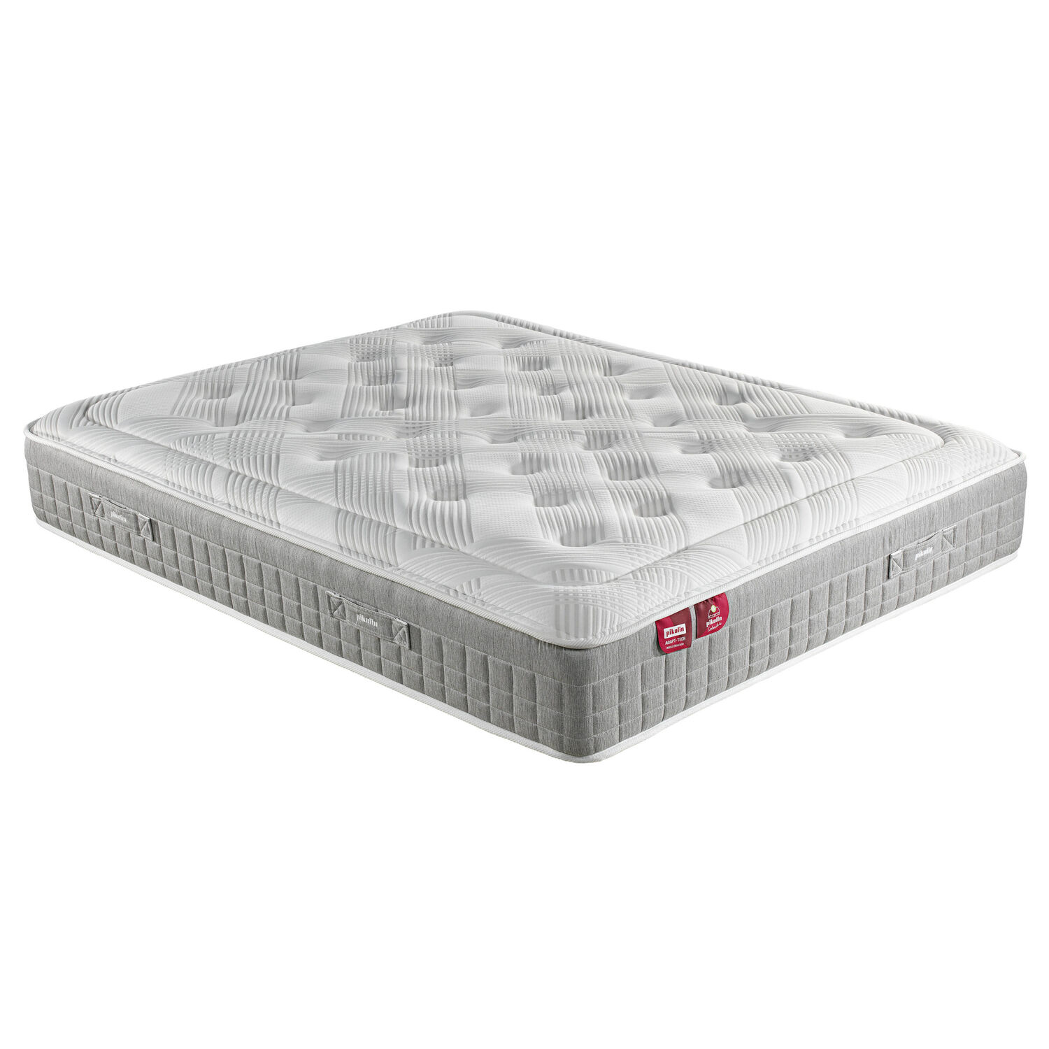 Un modelo de colchón acolchado blanco y gris con etiquetas.