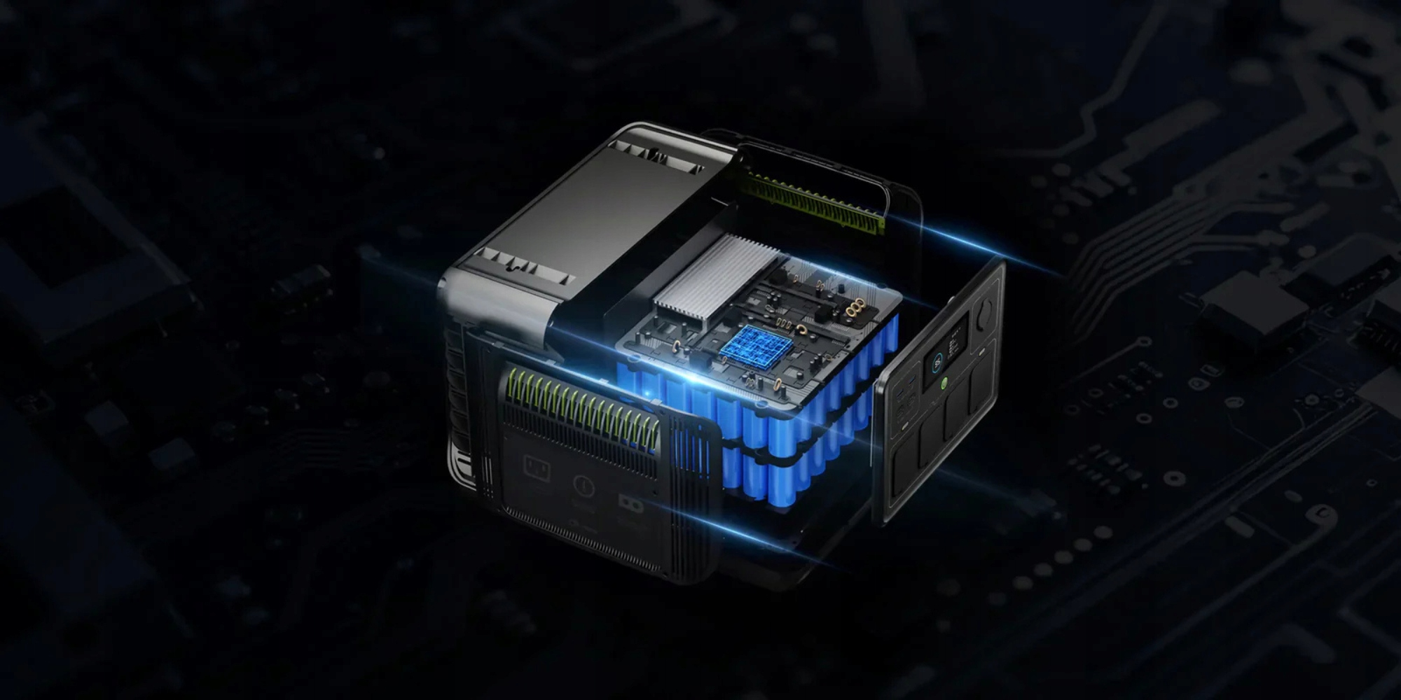 Widok przekroju stacji zasilającej pokazujący baterie, płytkę drukowaną i otwory wentylacyjne.