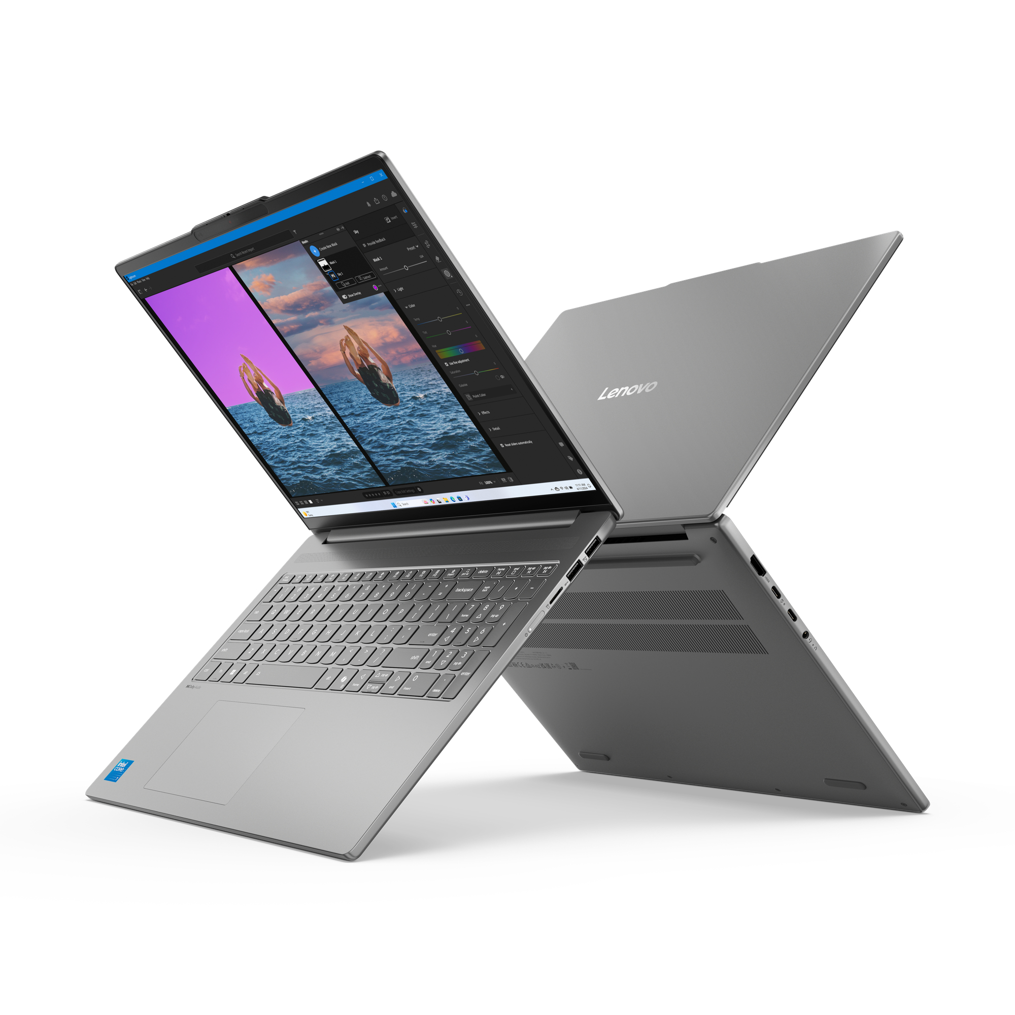 Un laptop argento con lo schermo aperto, che mostra un programma di fotoritocco.