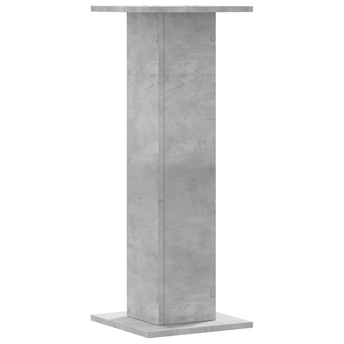 Ein grauer Betonpfeiler mit einer Basis und einer Platte.