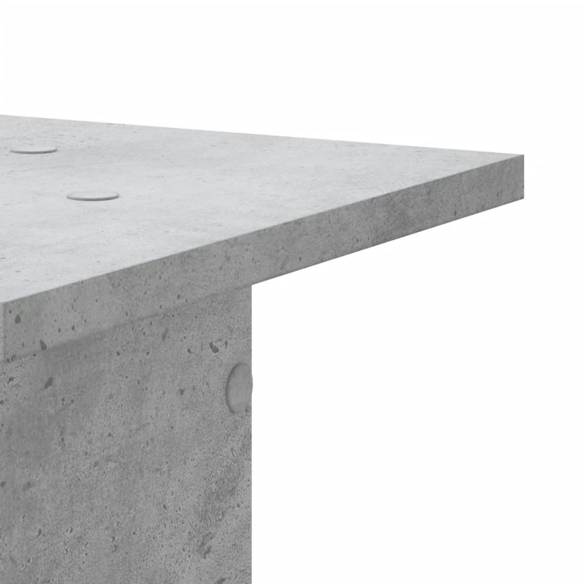 Graue Betonplatte mit abgerundeten Kanten und drei Aussparungen.