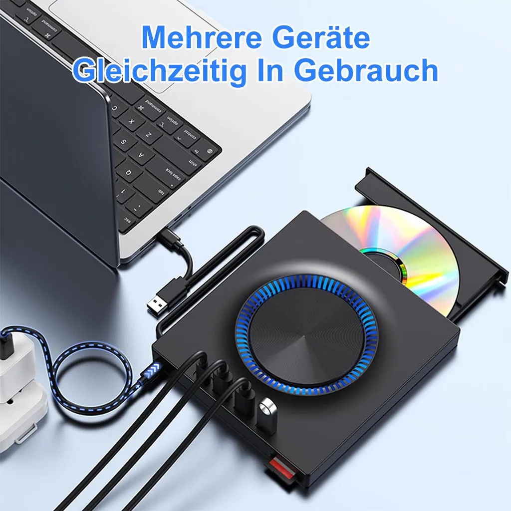 Ein externer CD-Brenner mit blauem Licht ist an einen Laptop angeschlossen.