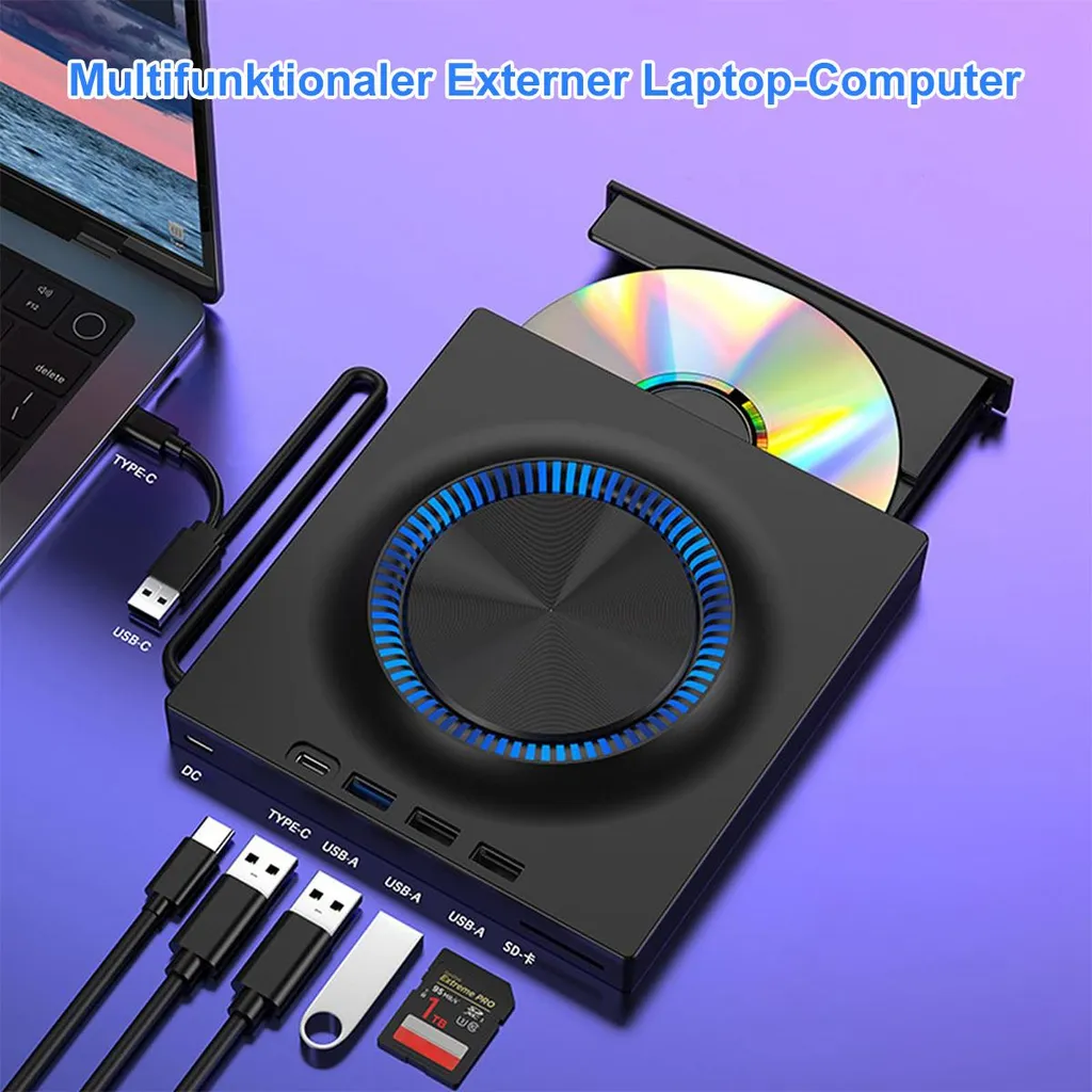 Externes Laufwerk mit CD und USB-Anschlüssen, verbunden mit Laptop.