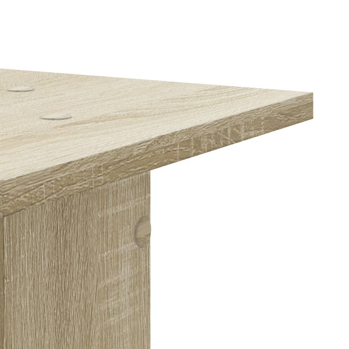 Nahaufnahme einer hellbraunen Holzplatte mit sichtbarer Maserung.