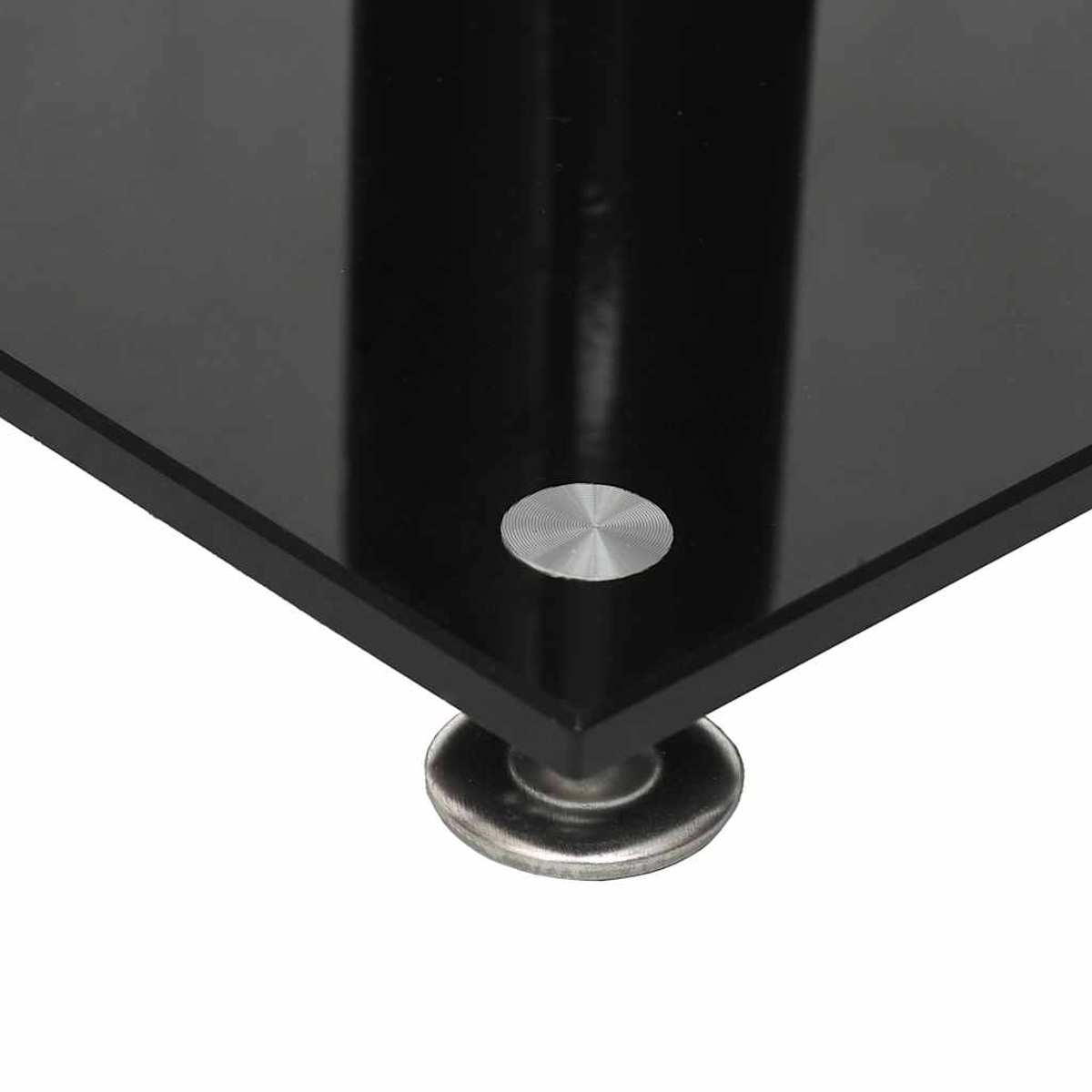 Nahaufnahme einer schwarzen Glasplatte mit einem silbernen Befestigungsdetail und einem Fuß.
