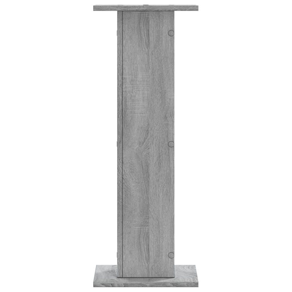 Ein grauer Holzsockel mit einer Säule und einer Platte oben.