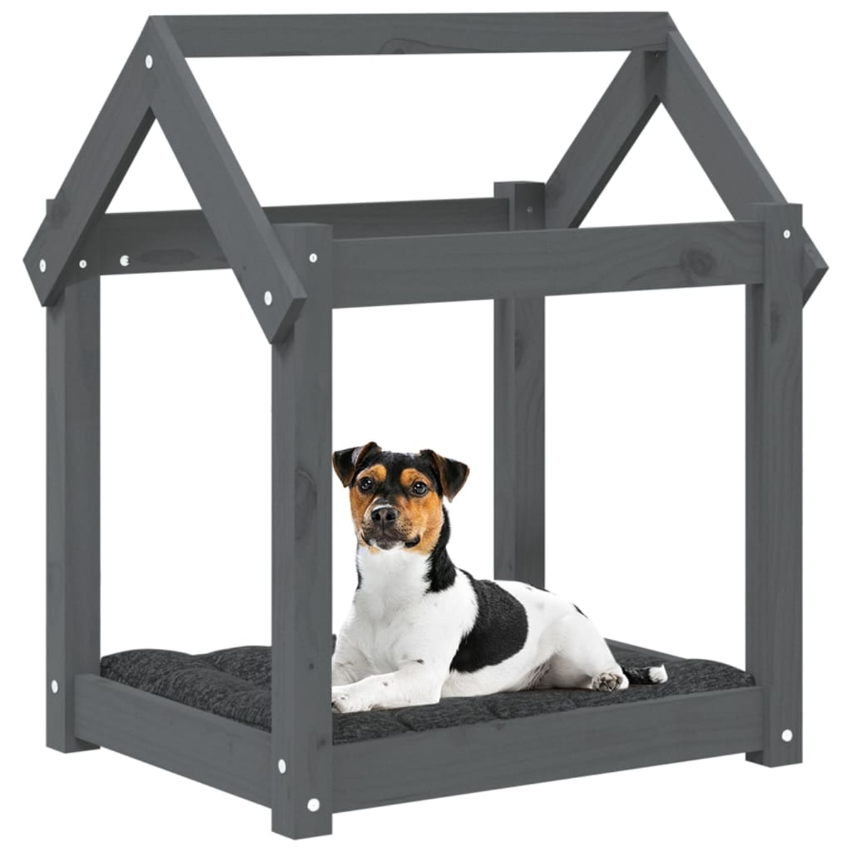 Ein Hund liegt in einem grauen Holzhundhaus auf einem dunklen Kissen.