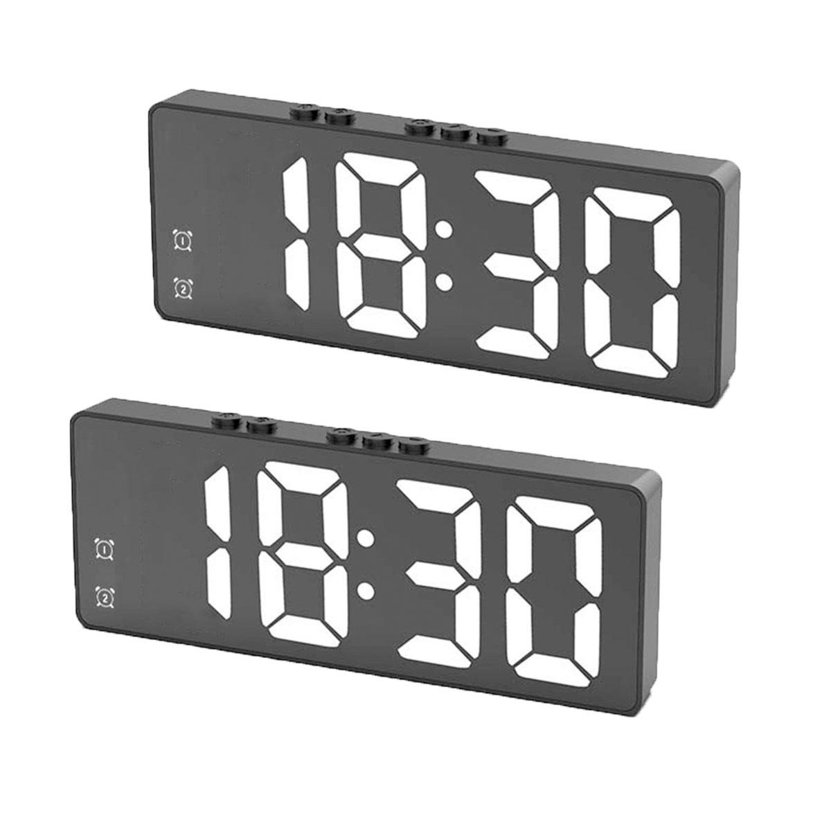 Zwei digitale Wecker zeigen 18:30 an. Der obere hat ein Symbol für Alarm 1, der untere für Alarm 2.