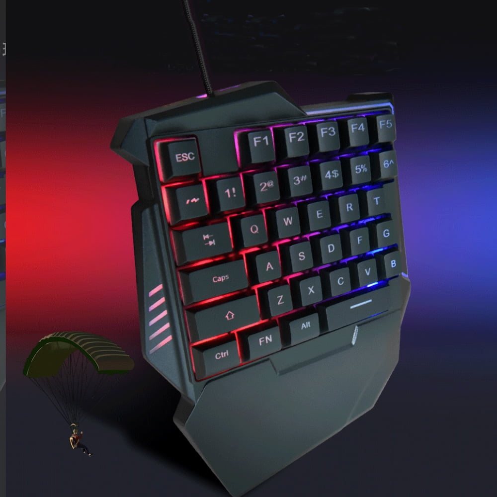 Ein Gaming-Tastatur-Pad mit beleuchteten Tasten und einem Fallschirmspringer.