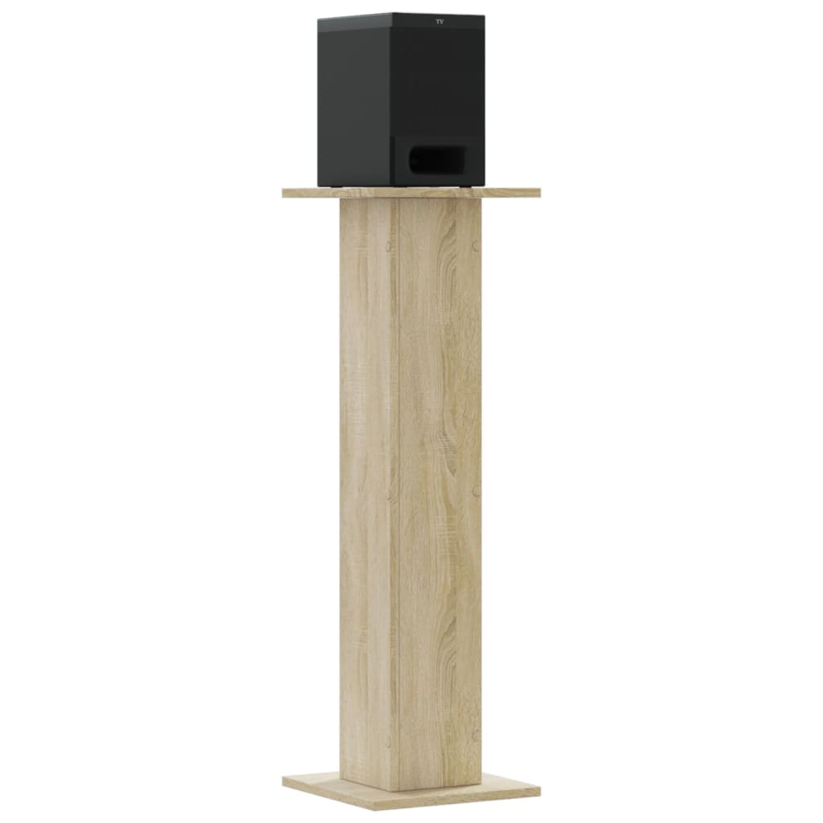 Ein schwarzer Subwoofer steht auf einem hellbraunen Holzsockel.