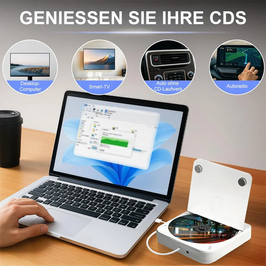 Ein Laptop mit externem CD-Laufwerk daneben. Über das Gerät kann man CDs auf PC, Smart-TV, Auto oder Autoradio nutzen.