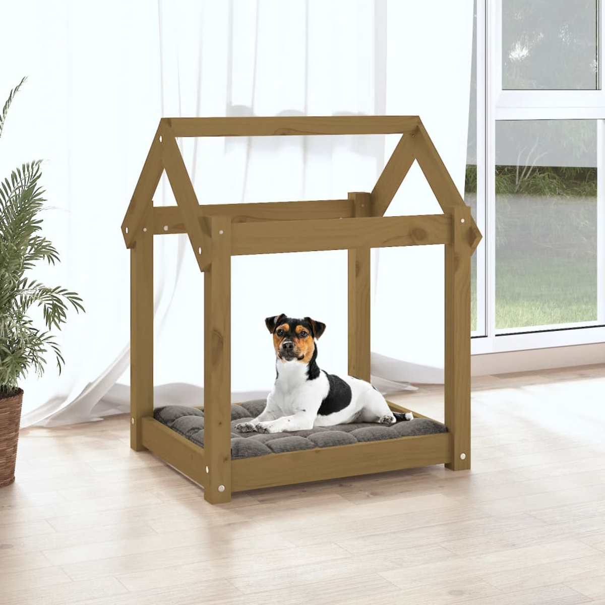 Ein Hund liegt auf einem Kissen in einem Holzhaus mit Dach.