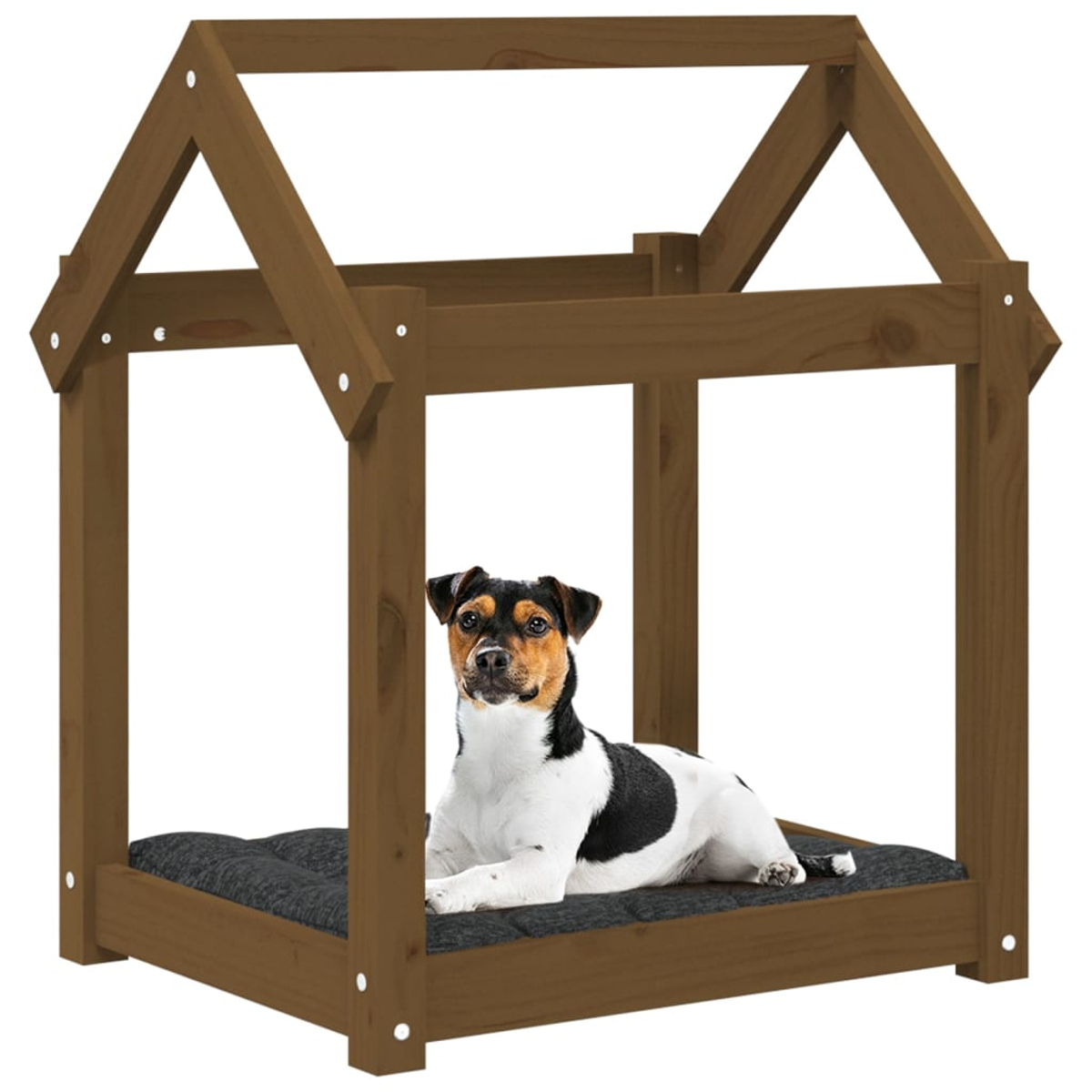 Ein Hund liegt auf einem Kissen in einem braunen Holzhaus.