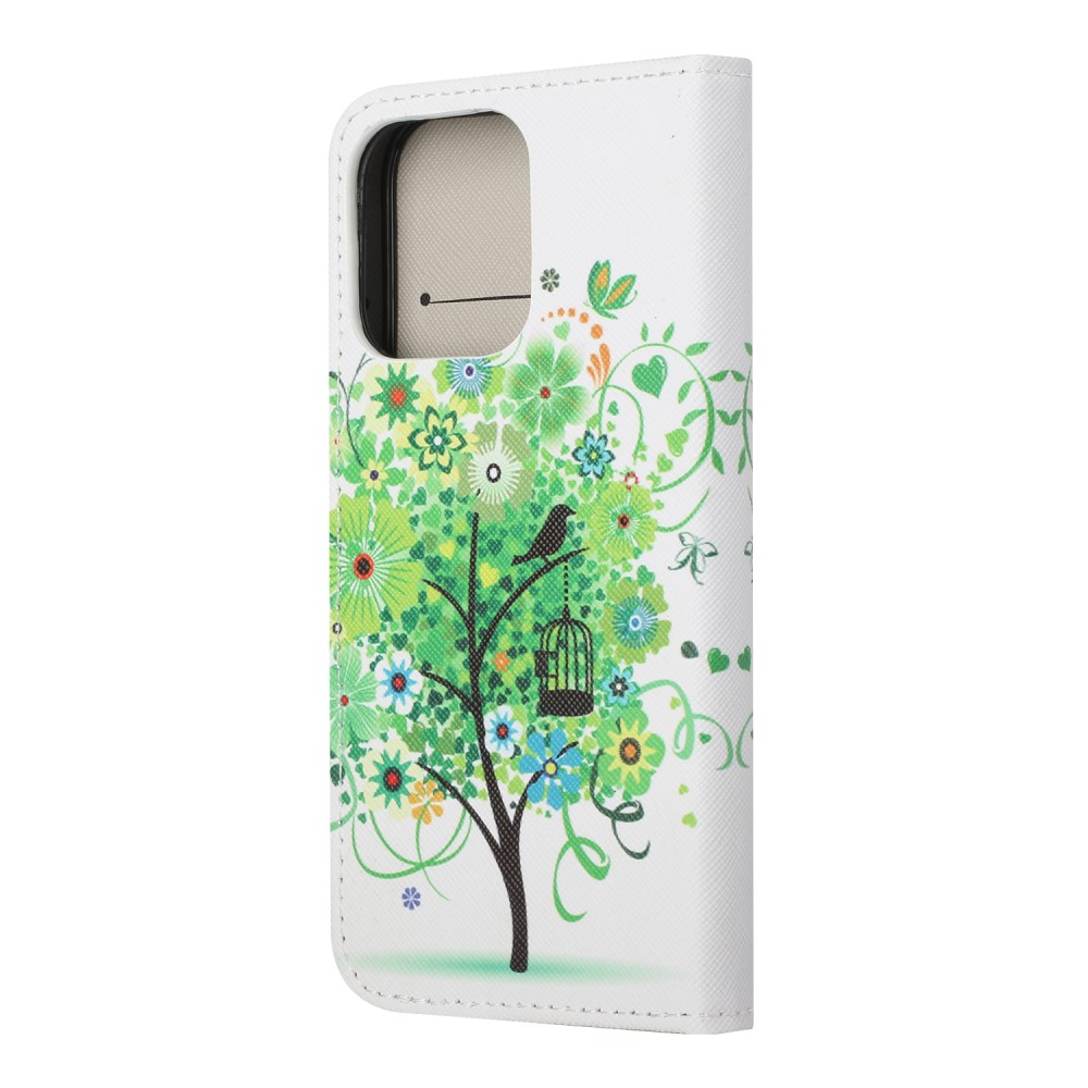 Custodia bianca per telefono con albero verde fiorito, uccello e gabbia.