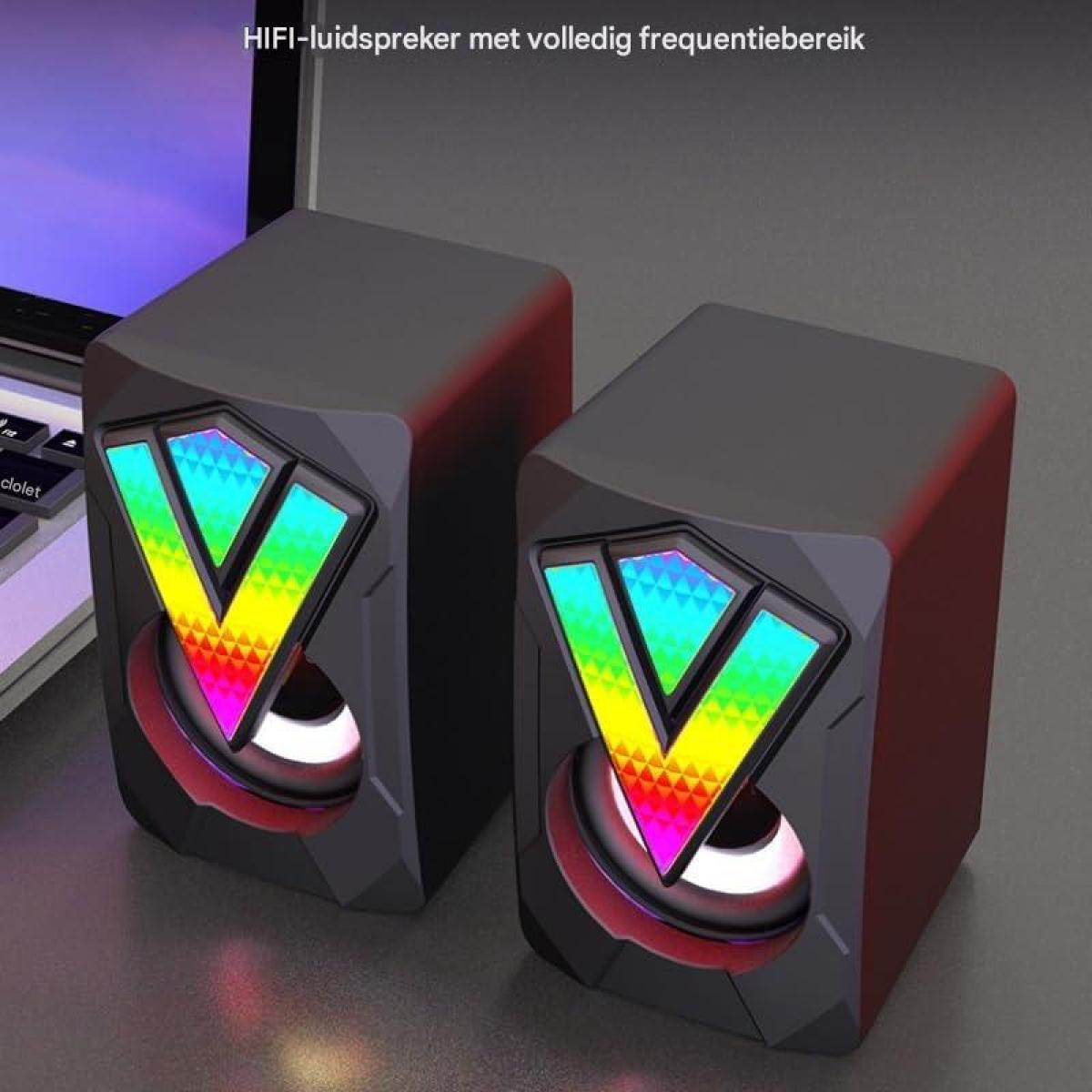 Zwei schwarze Lautsprecher mit bunten RGB-Lichtern, neben einem Laptop.