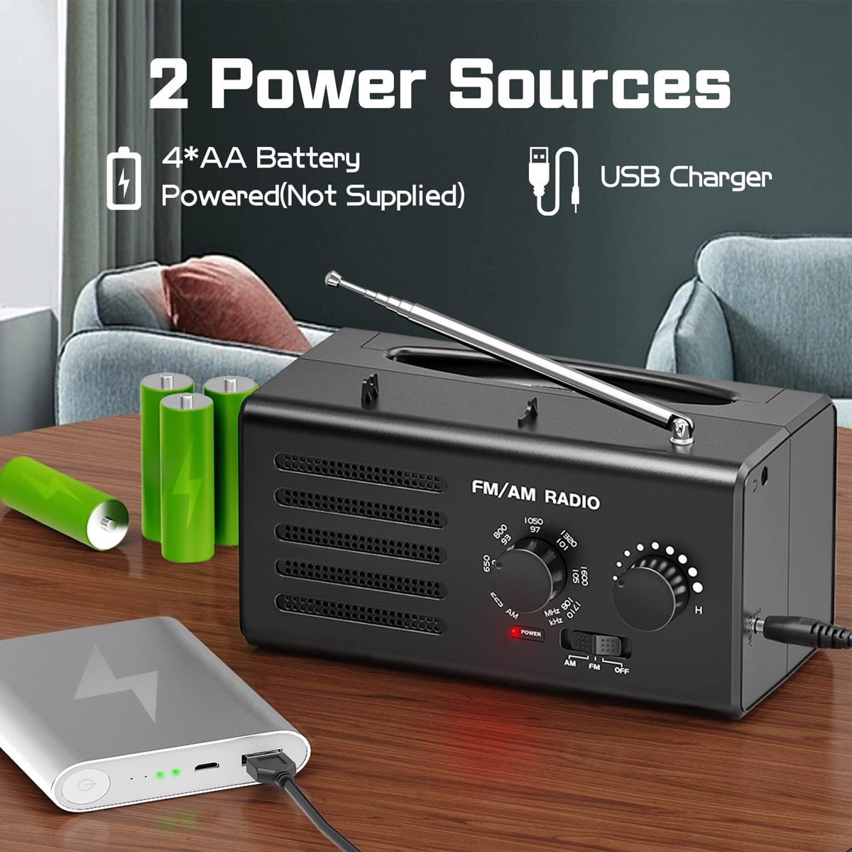 Ein schwarzes FM/AM-Radio mit Batterien und Powerbank.
