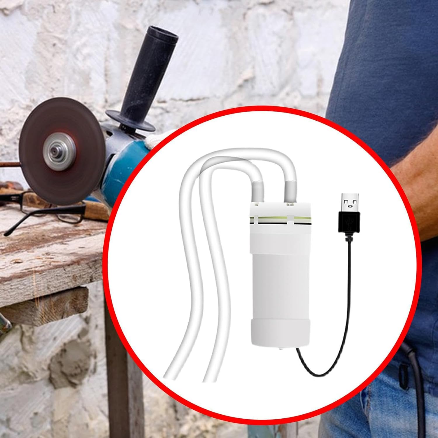 Winkelschleifer auf Werkbank mit USB-Gerät und Schläuchen im roten Kreis.
