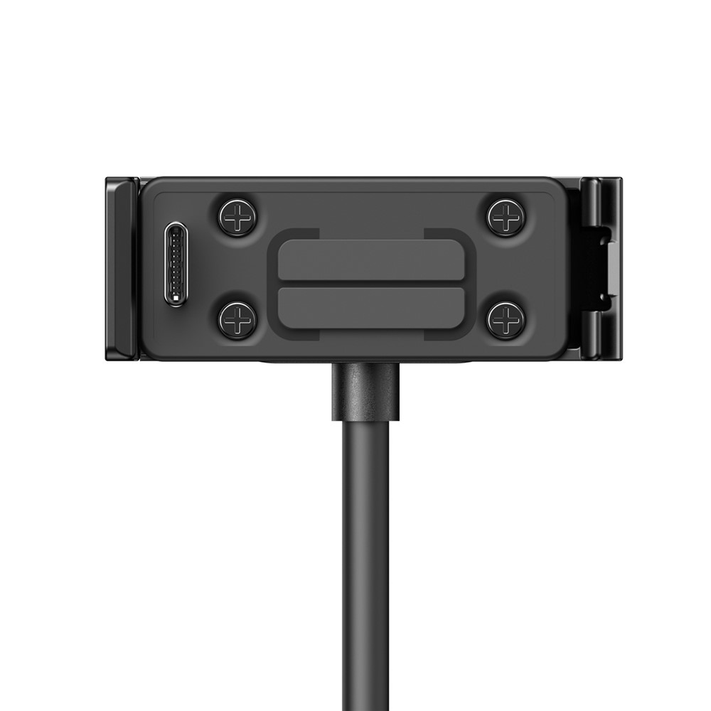 Schwarzes Kamerazubehör mit USB-C-Anschluss und vier Schrauben.
