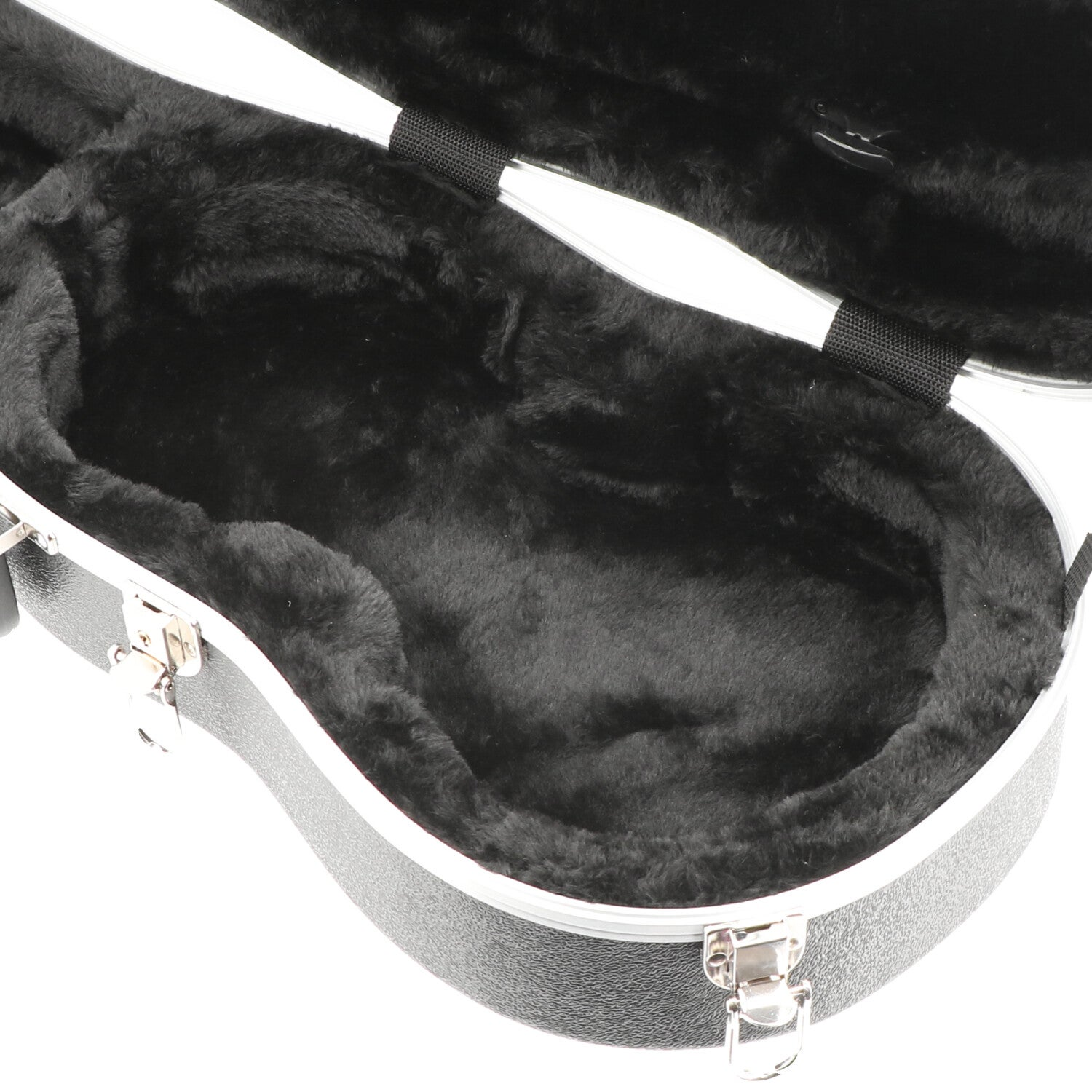 An empty, black, plush-lined instrument case with silver clasps.