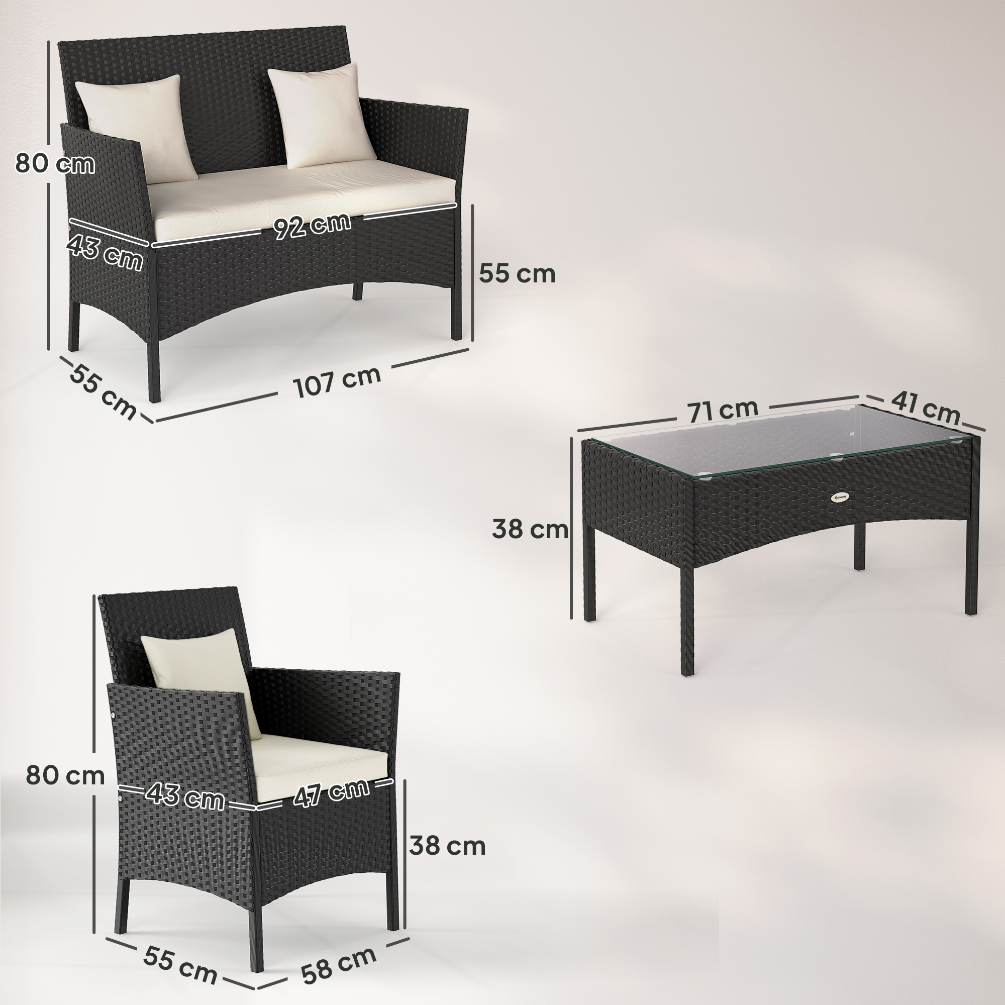 Mobiliario de jardín de mimbre: sofá negro de dos plazas, sillón y mesa de centro.