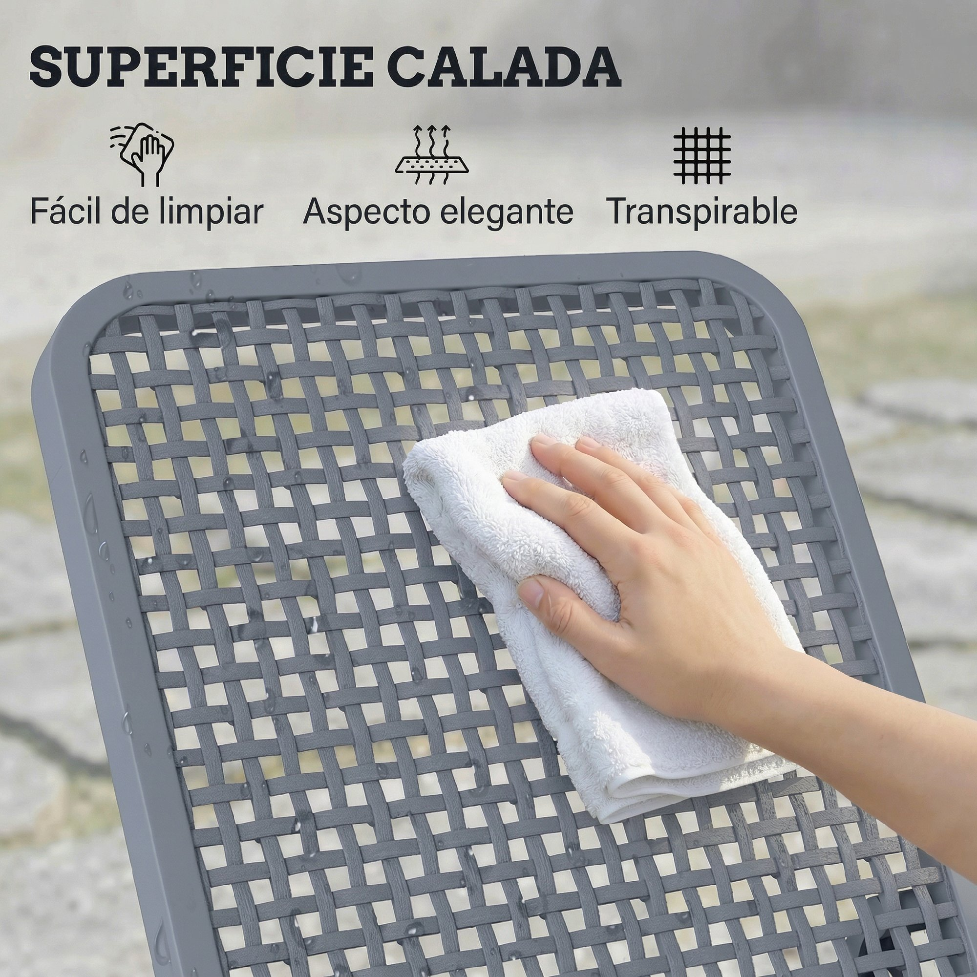 Una mano limpia una superficie gris tejida con un paño blanco.