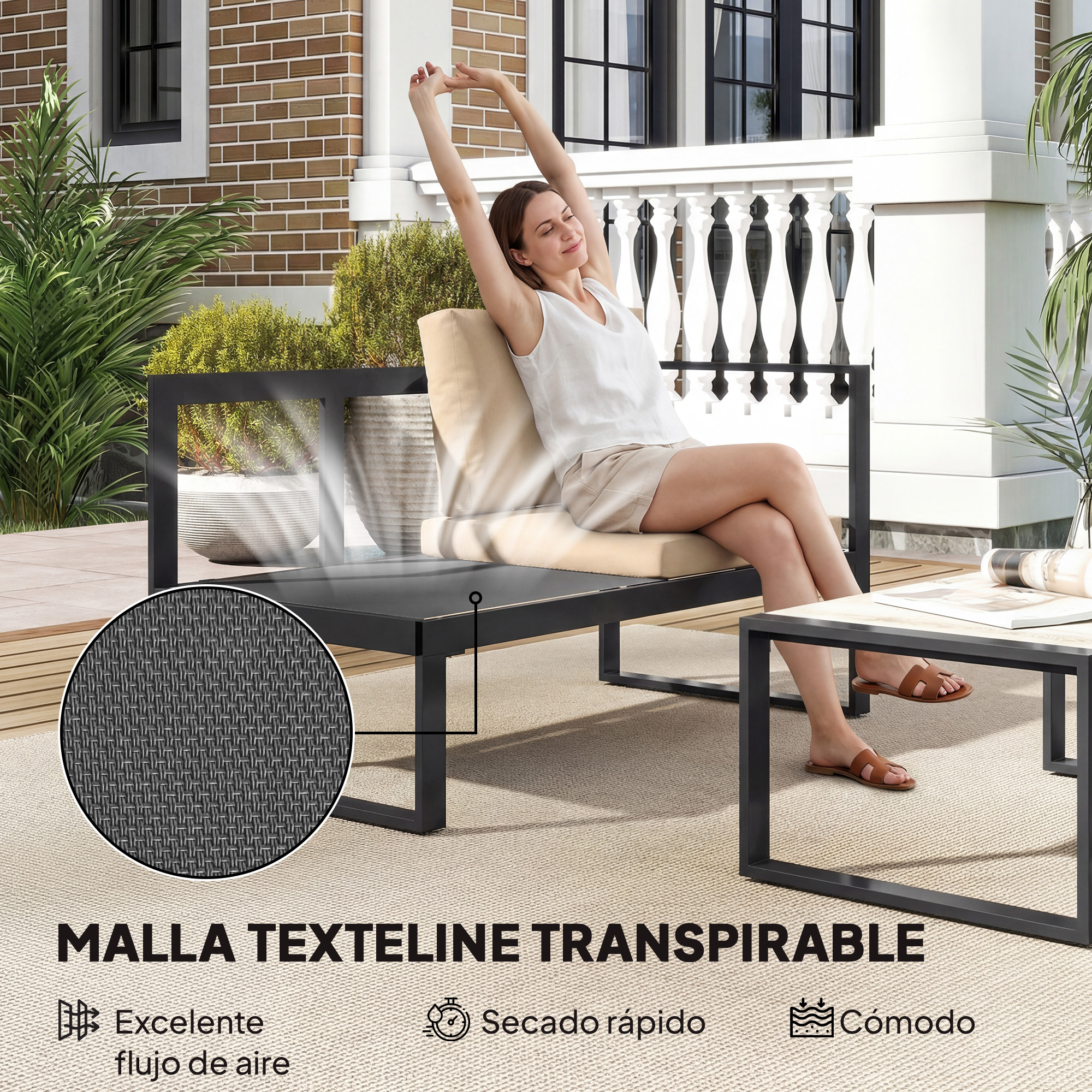 Mujer se estira en muebles de patio junto a una mesa.
