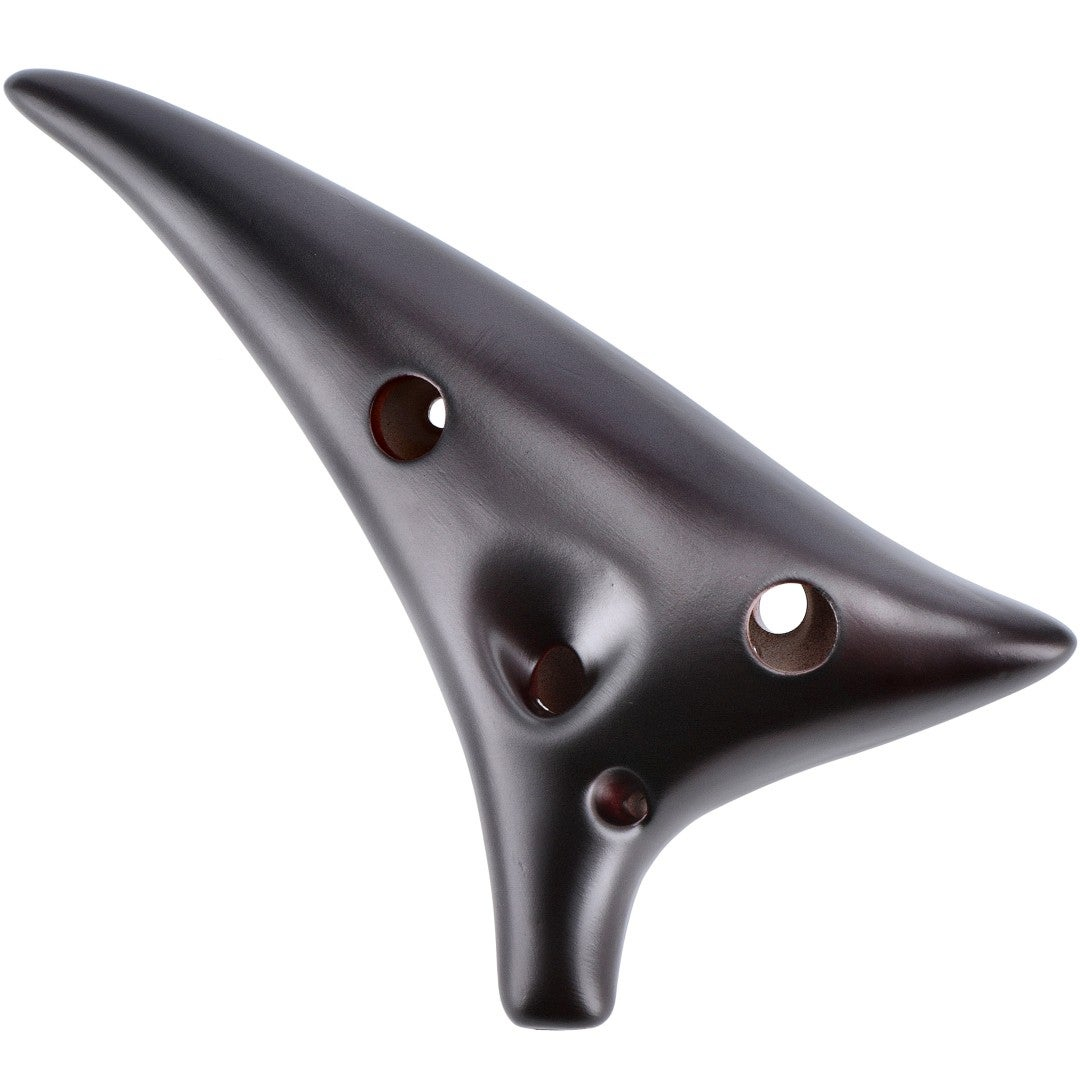 A dark brown ocarina with six holes, isolated on a white background.