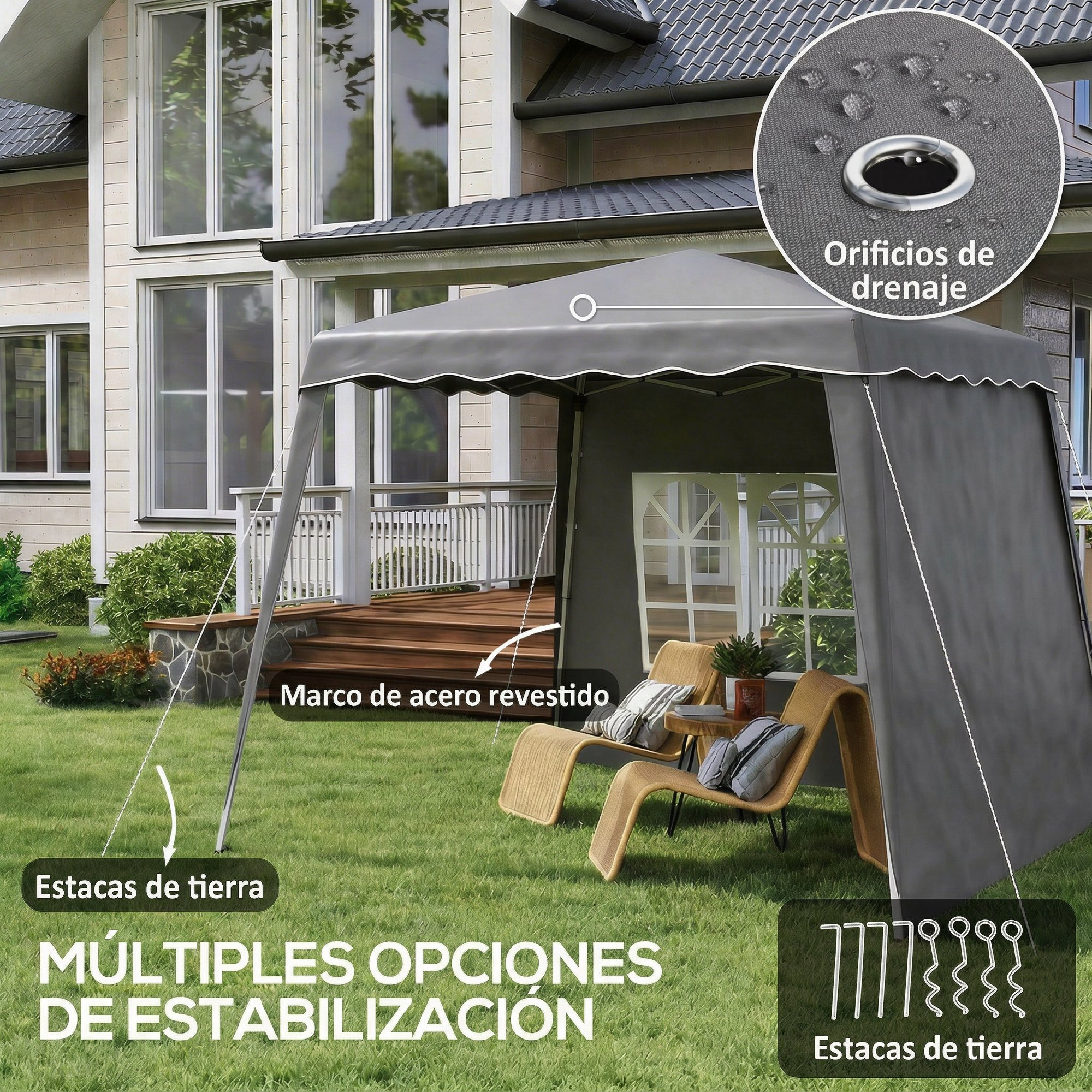 Una carpa gris con dos sillas delante, cerca de una casa con patio.