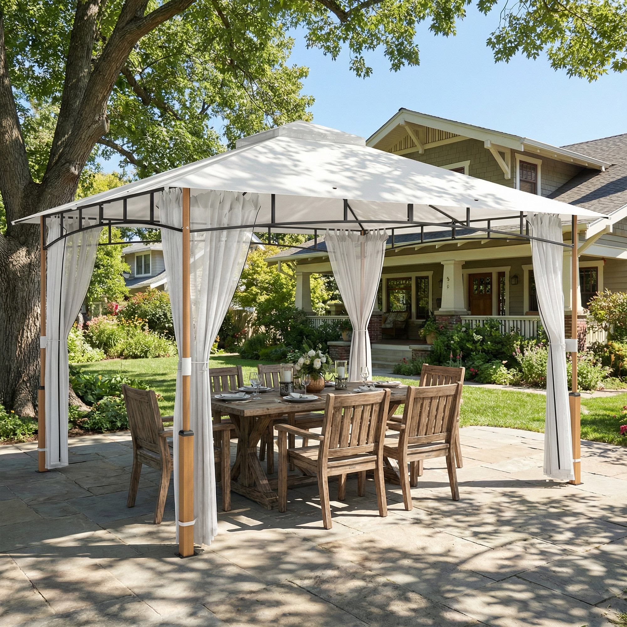 Un tavolo da pranzo con sei sedie sotto un gazebo bianco in un giardino.