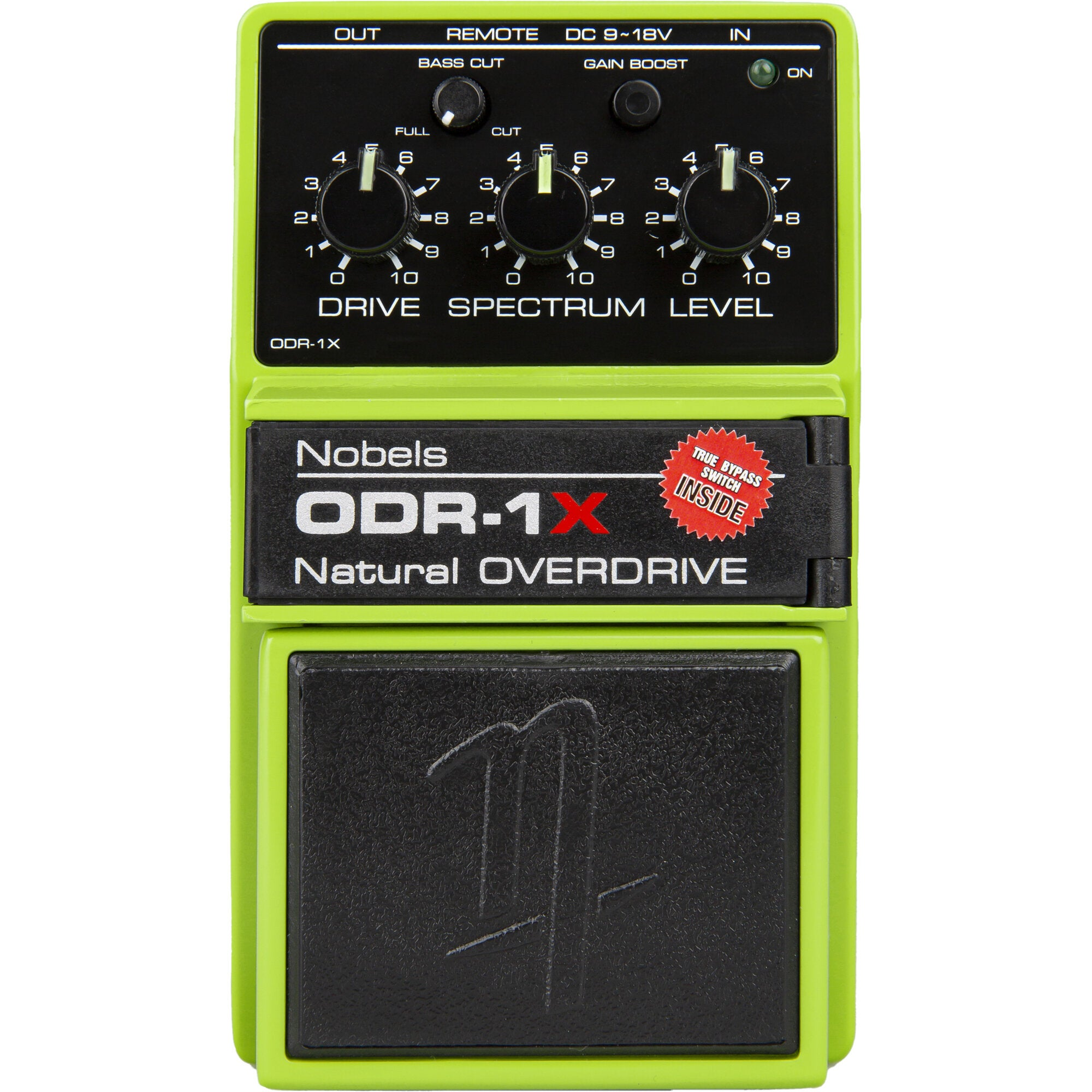 Groen gitaar overdrive effectpedaal met drie knoppen en een zwarte footswitch.