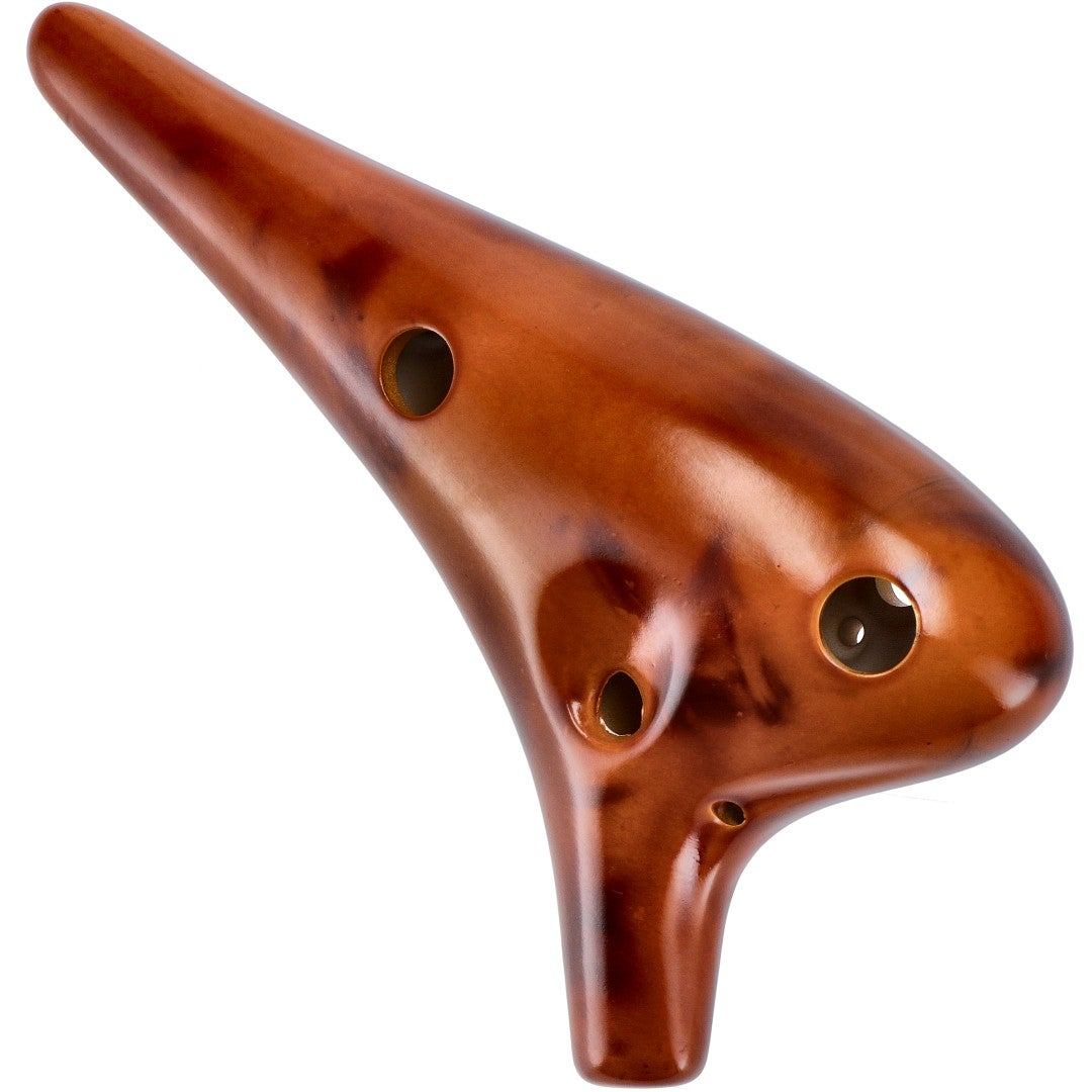 A glossy brown ocarina with seven holes rests on a white background.