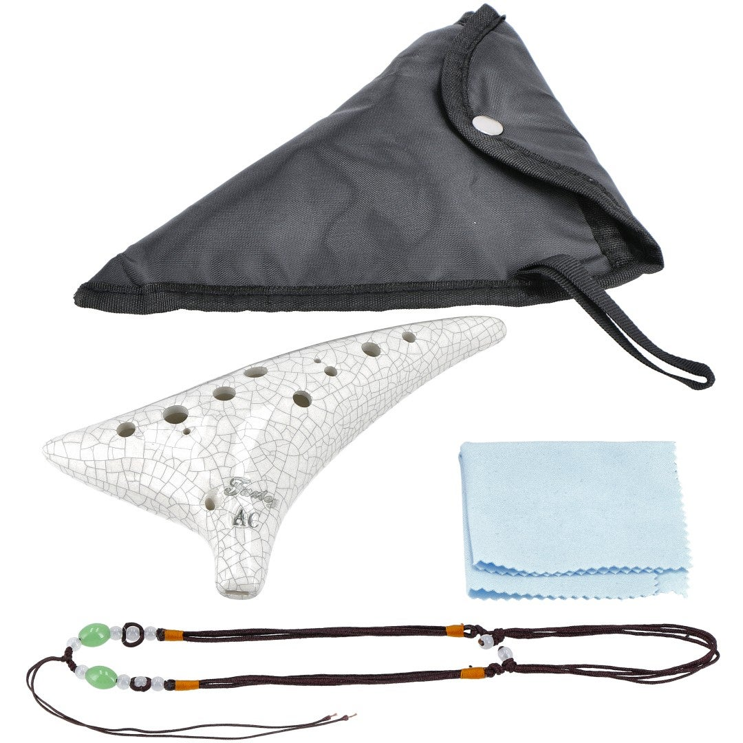 A white ocarina with a cracked glaze, a black case, cleaning cloth, and lanyard.