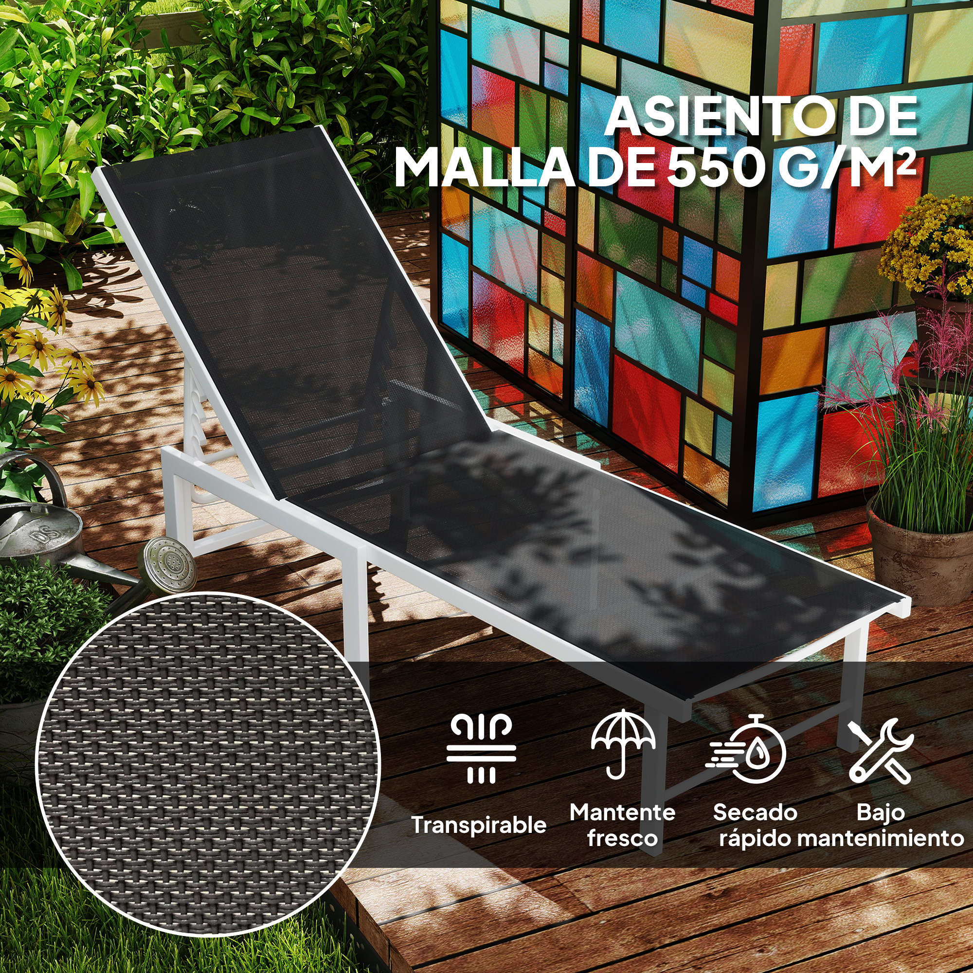 Una tumbona de malla negra con marco blanco en terraza de madera junto a pantalla colorida.